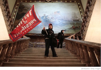 DKos: Trump insurrectionist waving Trump flag while attempting disruption of Electoral College count