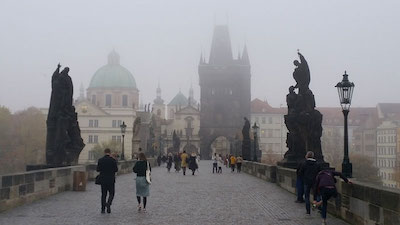 Charles Bridge in Prague in morning mist