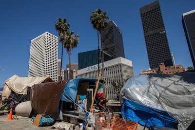 An encampment of homeless people next to a wealthy office district in Los Angeles