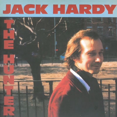 Album cover of The Hunter, showing Jack giving you the side-eye and a little grin, like he knows something you don't and is about to tell you a joke (both true)