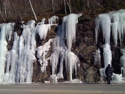 A New England icefall: artesian water exiting a mountainside under pressure, then frozen in place
